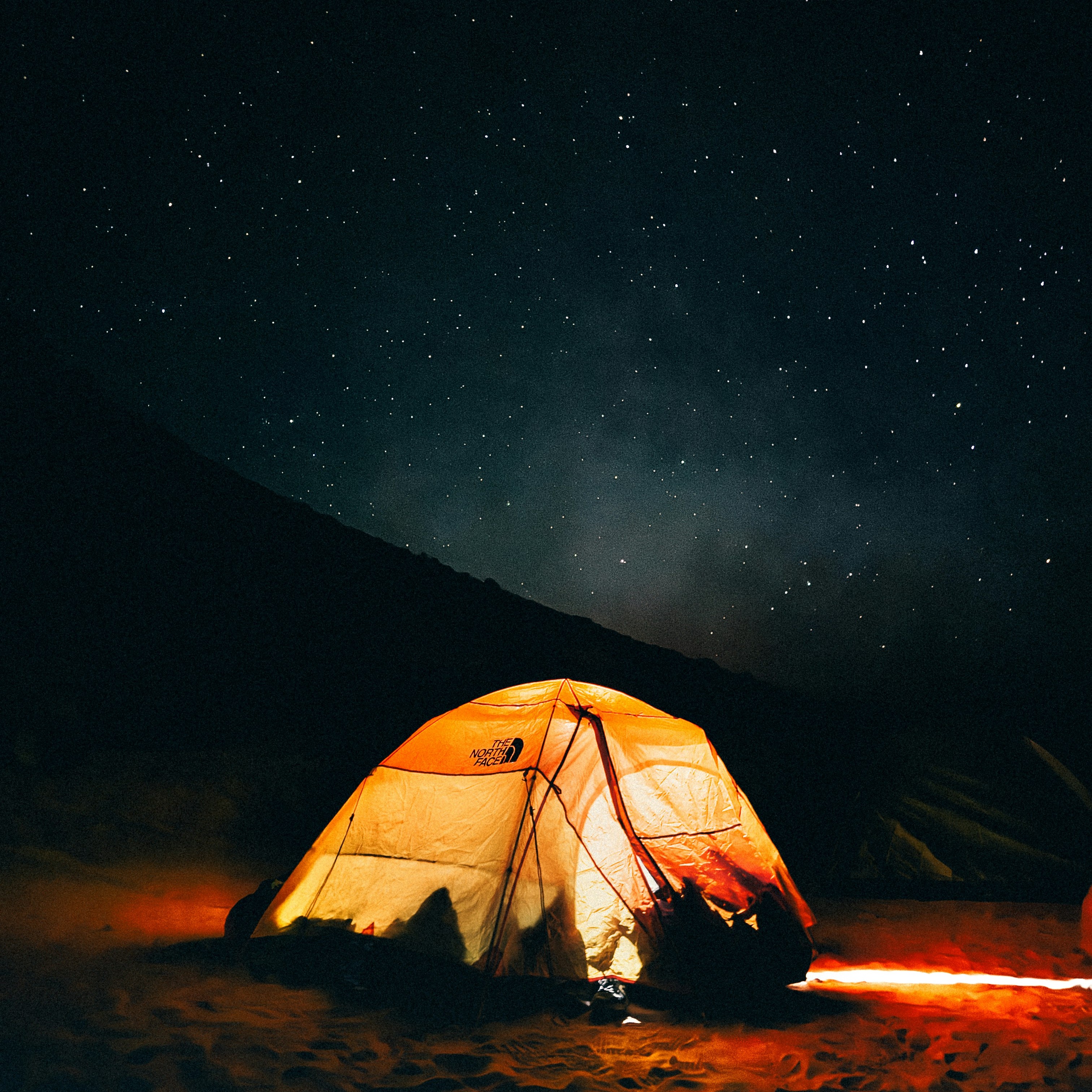 Private desert camp under stars