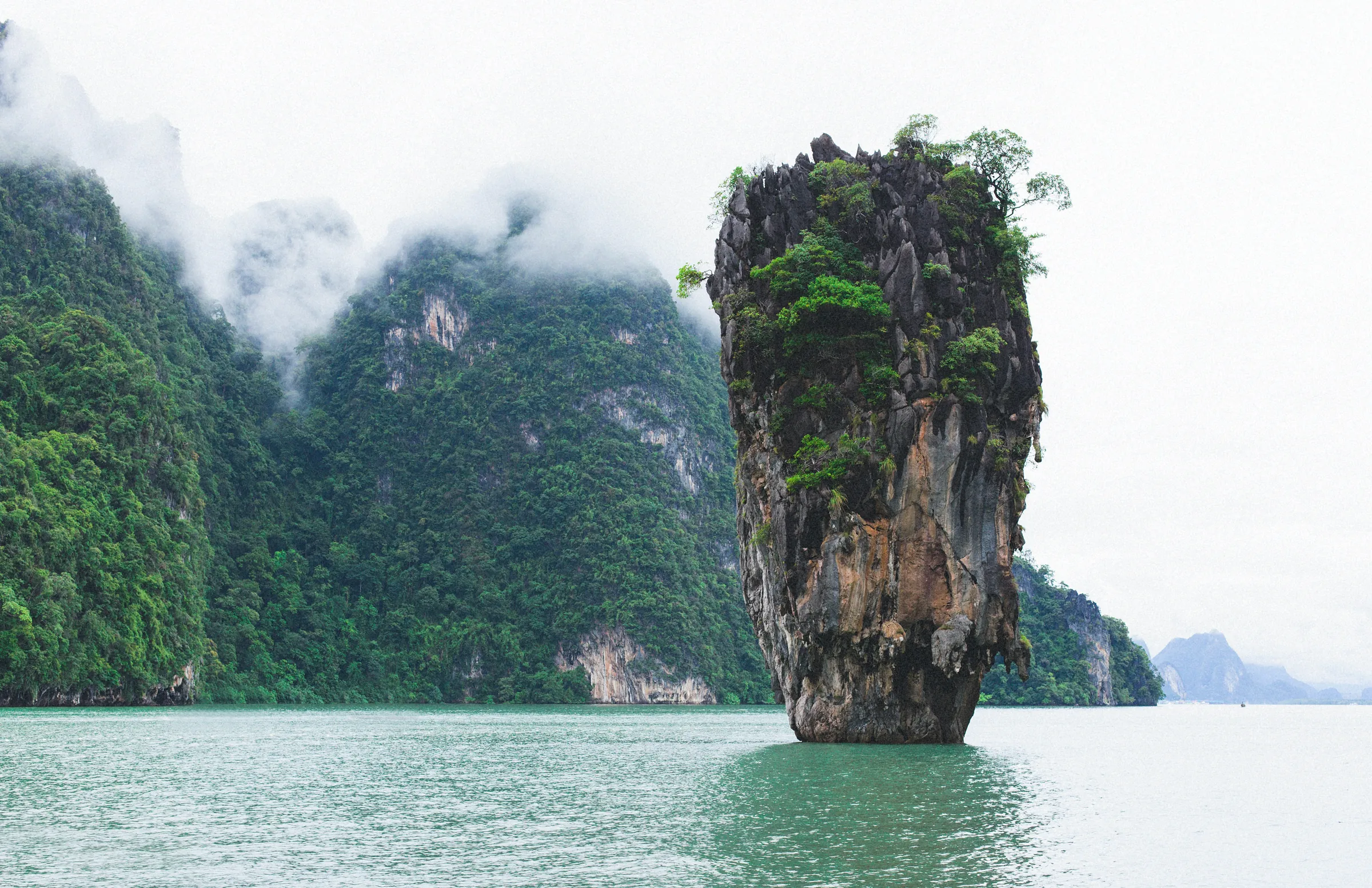 Limestone island rising from the bay